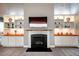 Comfortable living room area featuring a fireplace and built-in shelving at 2910 Reynolda Cir, Durham, NC 27712