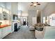 Bright living room with fireplace and open access to stairs and entry at 2910 Reynolda Cir, Durham, NC 27712
