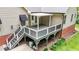 Expansive covered back deck offers outdoor living space with steps down to the backyard at 2917 Kesler Trl, Mebane, NC 27302