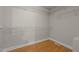 A well-organized walk-in closet with white wire shelving and wood-look flooring provides ample storage space at 2917 Kesler Trl, Mebane, NC 27302