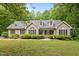 Charming home with manicured lawn and mature landscaping offers great curb appeal at 2917 Kesler Trl, Mebane, NC 27302