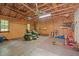 Spacious garage interior showcases ample room for storage and lawn equipment at 2917 Kesler Trl, Mebane, NC 27302