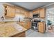 Kitchen features granite countertops, stainless steel appliances, and white subway tile backsplash at 2917 Kesler Trl, Mebane, NC 27302