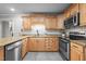 Kitchen features granite countertops, stainless steel appliances, and tile backsplash at 2917 Kesler Trl, Mebane, NC 27302