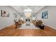 Spacious living room features a tray ceiling, fireplace, and hardwood floors at 2917 Kesler Trl, Mebane, NC 27302