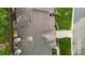 Aerial view of a home with a well-maintained roof, landscaping, and driveway at 3027 Maple Ave # M2, Burlington, NC 27215