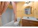 This full bathroom features a vanity sink and bath and shower at 3027 Maple Ave # M2, Burlington, NC 27215