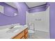 This full bathroom has modern fixtures and a shower and tub combination at 3027 Maple Ave # M2, Burlington, NC 27215
