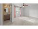 Spacious bedroom with natural light, ceiling fan and en suite bathroom at 3027 Maple Ave # M2, Burlington, NC 27215