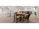 Spacious finished basement featuring a dining area and seating area with neutral carpet at 3028 Rothgeb Dr, Raleigh, NC 27609