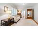 Bright bedroom features hardwood floors, white walls, and large windows at 3028 Rothgeb Dr, Raleigh, NC 27609