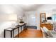 Elegant foyer featuring hardwood floors, console table, and stylish decor at 3028 Rothgeb Dr, Raleigh, NC 27609