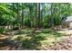 Backyard with wooden swing at 305 Monterey Ct, Benson, NC 27504