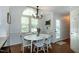 Bright dining area with hardwood floors and view of backyard at 305 Monterey Ct, Benson, NC 27504