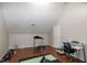Upstairs exercise room includes a treadmill, exercise mat, weights and a desk at 305 Monterey Ct, Benson, NC 27504