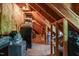 Unfinished attic space with exposed rafters and insulation, useful for storage or conversion at 3201 Keighley Forest Dr, Wake Forest, NC 27587