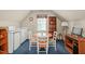 This bonus room offers versatile space, including a kitchenette, table, and plenty of storage at 3201 Keighley Forest Dr, Wake Forest, NC 27587