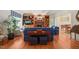 Spacious living room features hardwood floors, built-in shelving, a fireplace and comfortable seating at 3201 Keighley Forest Dr, Wake Forest, NC 27587