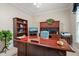 Office showcasing a traditional desk with built-ins, a bookshelf, and ample natural light at 3201 Keighley Forest Dr, Wake Forest, NC 27587
