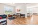 Spacious playroom with hardwood floors and plenty of natural light at 325 Porterfield Dr, Youngsville, NC 27596