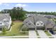 Wide aerial shot of a residential community featuring orderly streets and verdant green spaces at 3406 Antler View Dr, Apex, NC 27502