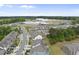 Aerial view of a new construction neighborhood with community features and modern homes at 3406 Antler View Dr, Apex, NC 27502