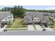 Charming townhome with a landscaped lawn, a two-car garage, and a welcoming entryway at 3406 Antler View Dr, Apex, NC 27502