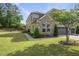 Beautiful two-story home featuring a brick and siding exterior and a well-manicured lawn at 3406 Antler View Dr, Apex, NC 27502