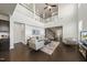 Spacious living room with high ceilings, hardwood floors, a staircase, and plenty of natural light at 3406 Antler View Dr, Apex, NC 27502