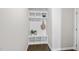 Inviting mudroom with built-in storage, coat hooks, and a bench at 3406 Antler View Dr, Apex, NC 27502