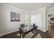Versatile office space with a wooden desk, neutral walls, and bright natural lighting at 3406 Antler View Dr, Apex, NC 27502