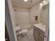 Cozy bathroom with a shower over bath, stylish vanity and modern fixtures at 3523 Ivy Commons Dr # 102, Raleigh, NC 27606