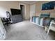 This comfortable bedroom offers neutral carpet, a full bed, and a chest of drawers at 3523 Ivy Commons Dr # 102, Raleigh, NC 27606