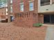 Charming brick building exterior with well-maintained landscaping in a desirable neighborhood at 3523 Ivy Commons Dr # 102, Raleigh, NC 27606