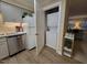 Modern kitchen includes updated appliances with a convenient washer/dryer closet at 3523 Ivy Commons Dr # 102, Raleigh, NC 27606