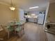 Modern kitchen featuring stainless steel appliances, and a dining area for a comfortable meal at 3523 Ivy Commons Dr # 102, Raleigh, NC 27606