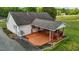 Aerial view of the back of the house with a covered back deck and fenced in back yard at 3603 Westmeadow Ln, Elon, NC 27244