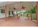 Beautiful covered back deck with ceiling fans and a lovely view at 3603 Westmeadow Ln, Elon, NC 27244