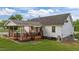 Side view of the house showcasing the covered back deck at 3603 Westmeadow Ln, Elon, NC 27244