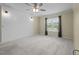 Spacious main bedroom features neutral carpet and a shiplap accent wall for a modern touch at 3603 Westmeadow Ln, Elon, NC 27244