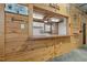 Serving bar overlooking kitchenette area in converted garage at 3603 Westmeadow Ln, Elon, NC 27244