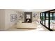 Bright living room with fireplace, built-in shelving, and a large sliding glass door to the outdoor patio at 389 Deer Tail Ln # 39, Fuquay Varina, NC 27526