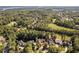 Aerial view showcasing the community's lush landscaping and charming homes at 39 Forked Pine Ct, Chapel Hill, NC 27517