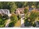 Beautiful aerial view of a well-manicured single-story home with a long driveway at 39 Forked Pine Ct, Chapel Hill, NC 27517