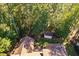Birds eye view of roof of home, screened in porch and wooded backyard at 39 Forked Pine Ct, Chapel Hill, NC 27517