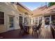 Spacious wooden deck with outdoor dining set, perfect for enjoying the backyard view at 39 Forked Pine Ct, Chapel Hill, NC 27517