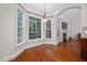 Bright dining area features hardwood floors, a bay window, and stylish lighting fixtures at 39 Forked Pine Ct, Chapel Hill, NC 27517