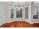 The dining room features hardwood floors and a bay window, perfect for Gathering gatherings at 39 Forked Pine Ct, Chapel Hill, NC 27517