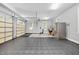 Spacious two car garage with epoxy floors, storage, and an abundance of natural light at 39 Forked Pine Ct, Chapel Hill, NC 27517