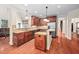 Well-equipped kitchen featuring granite countertops, stainless appliances, and custom cabinetry at 39 Forked Pine Ct, Chapel Hill, NC 27517
